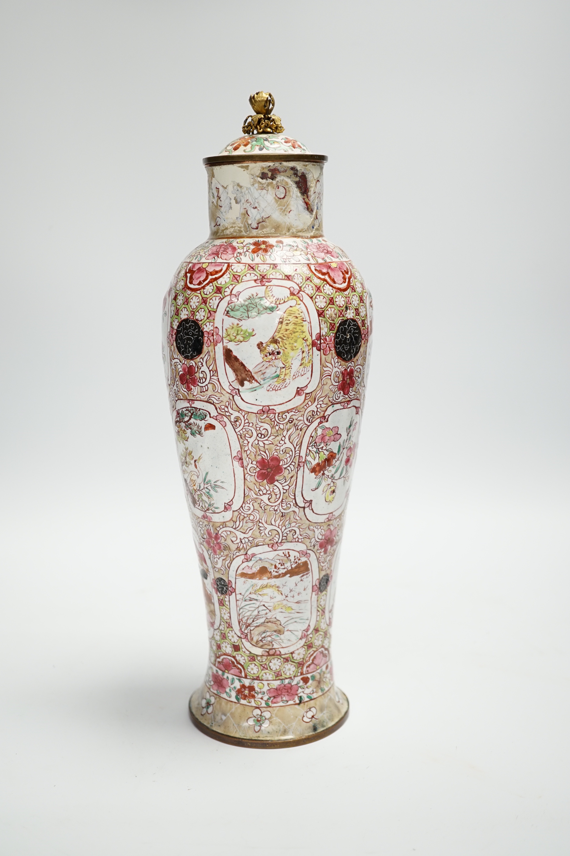 An 18th century Canton enamel European subject vase and associated cover, 30cm high